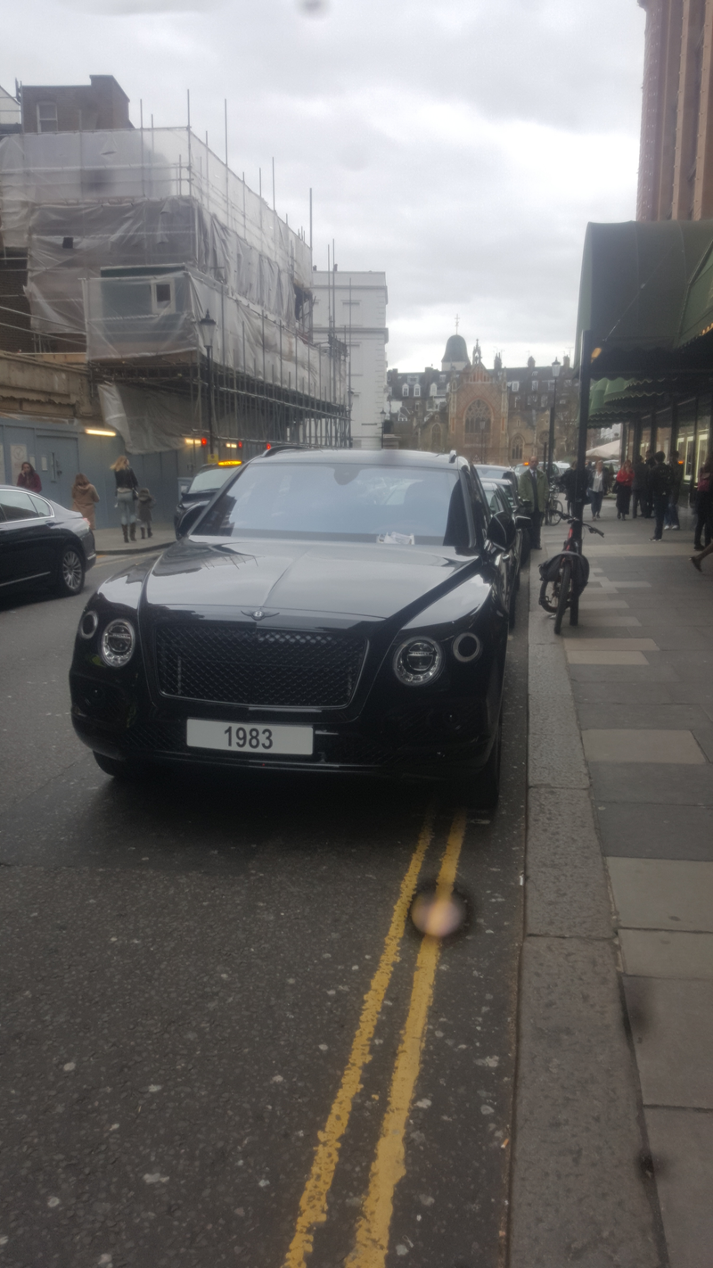 Illustration for article titled Bentayga with parking ticket and others